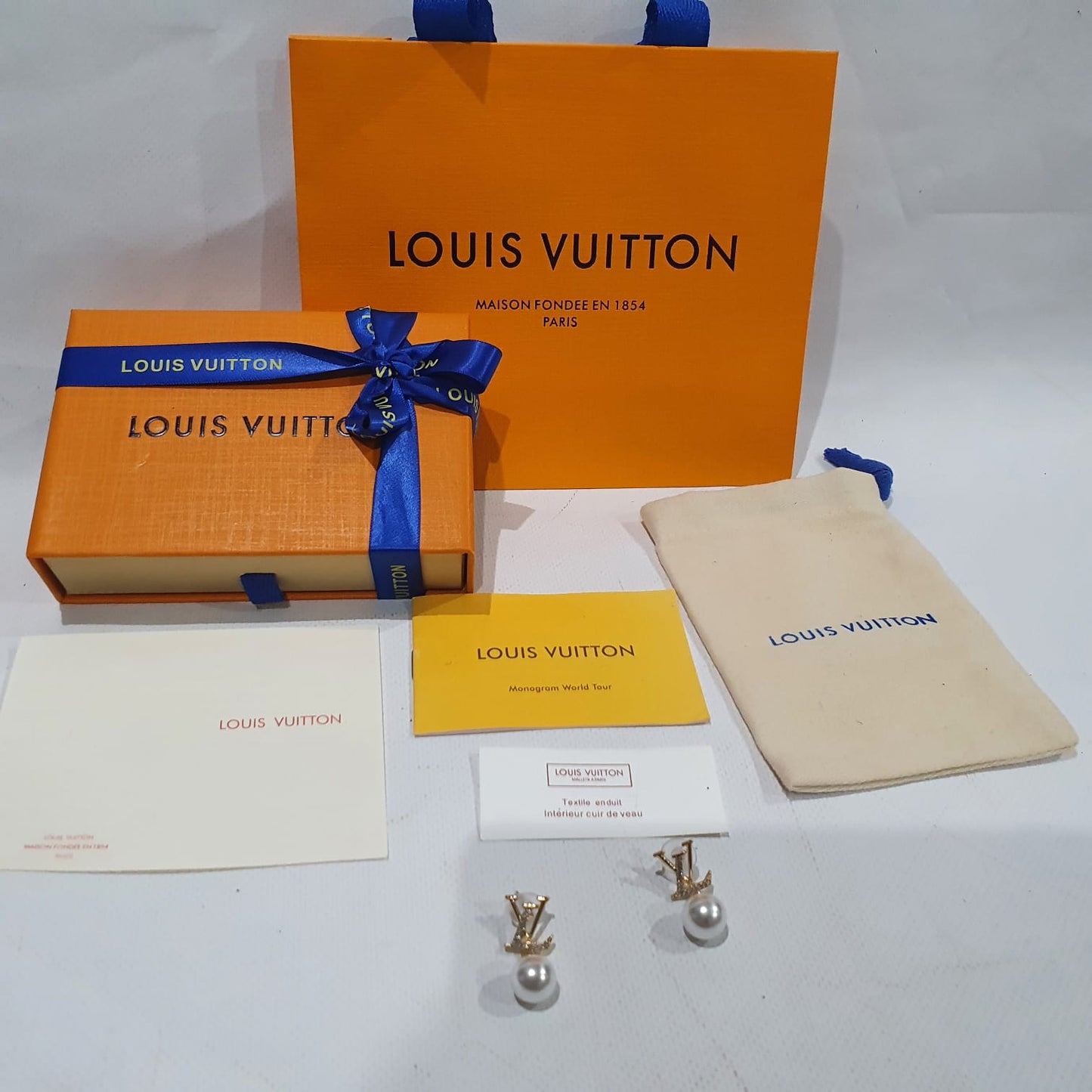 Louis Vuitton Earrings.