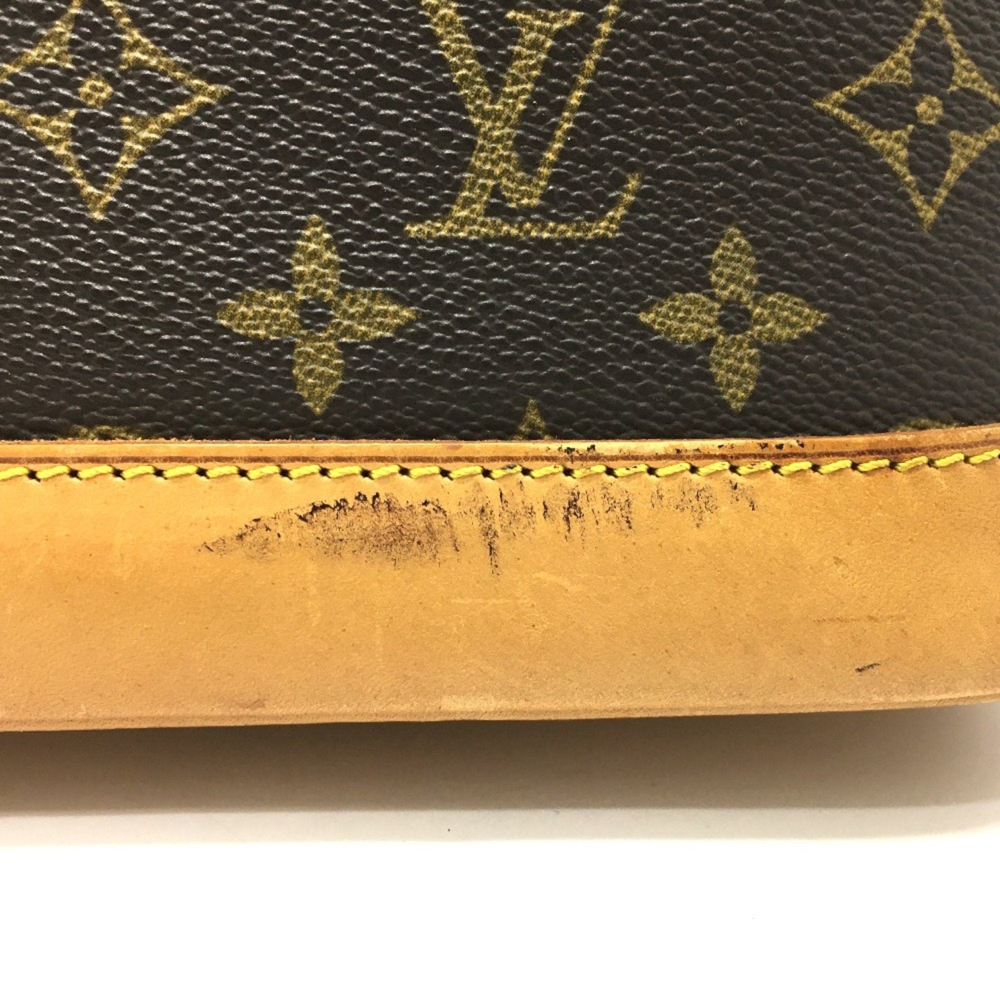 LOUIS VUITTON Alma Handbag