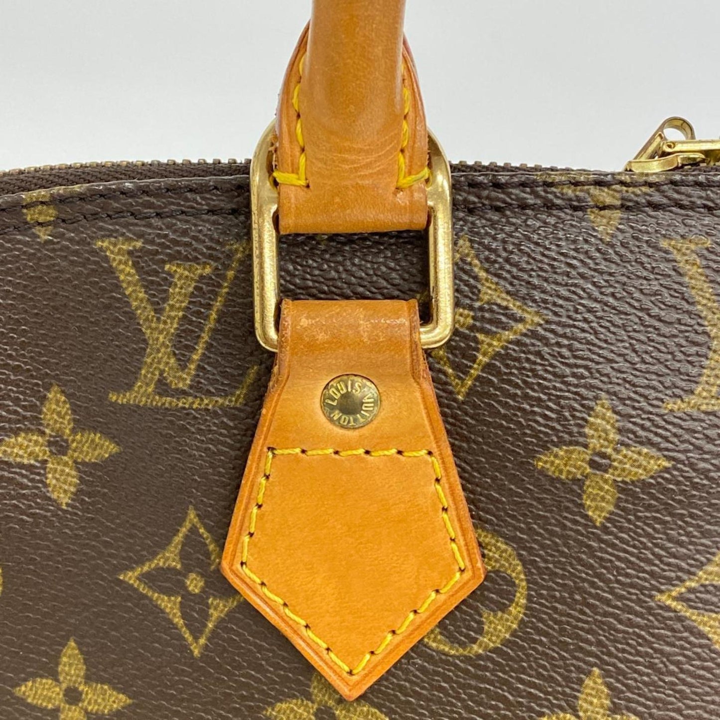 LOUIS VUITTON Alma Handbag