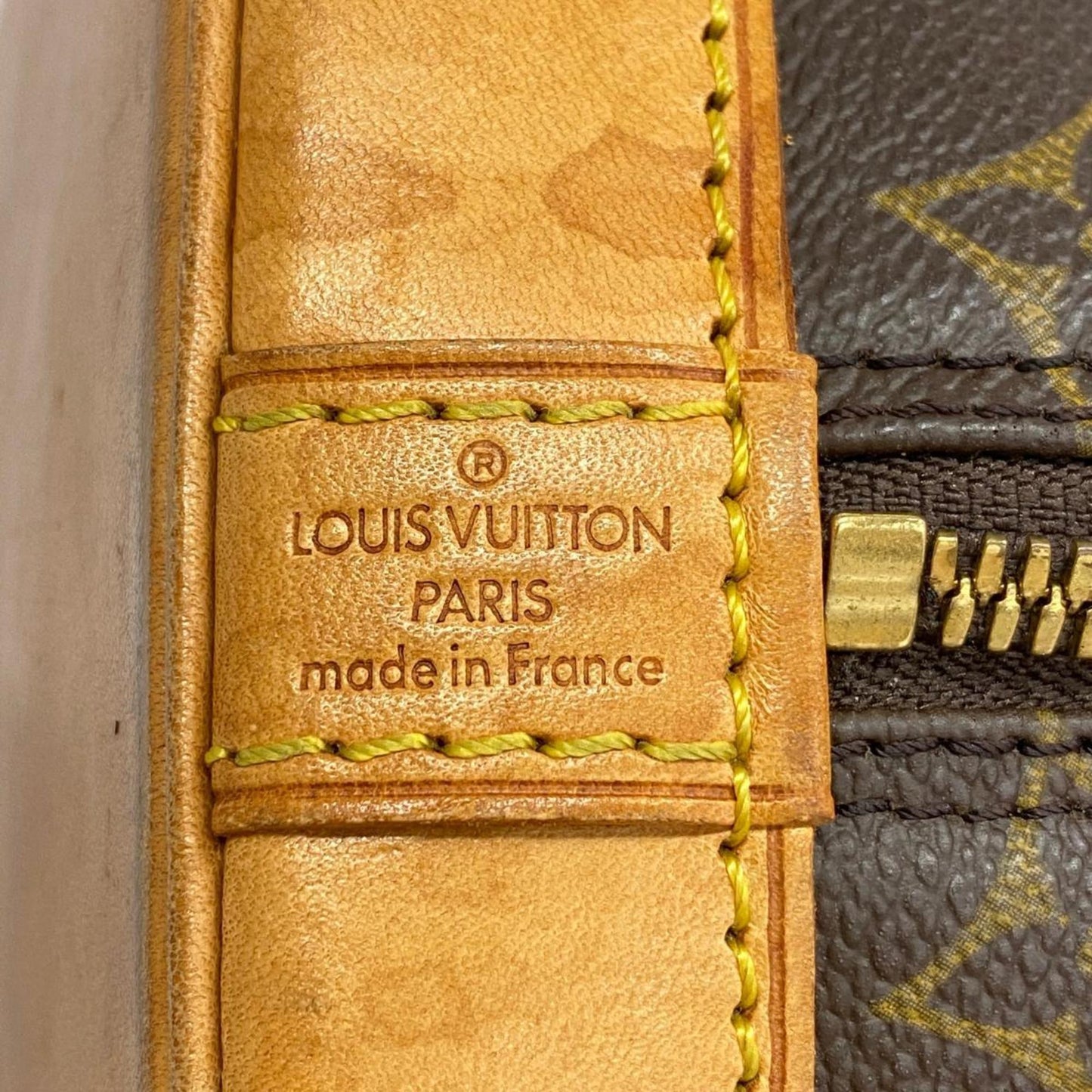 LOUIS VUITTON Alma Handbag