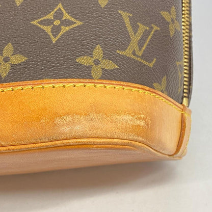 LOUIS VUITTON Alma Handbag