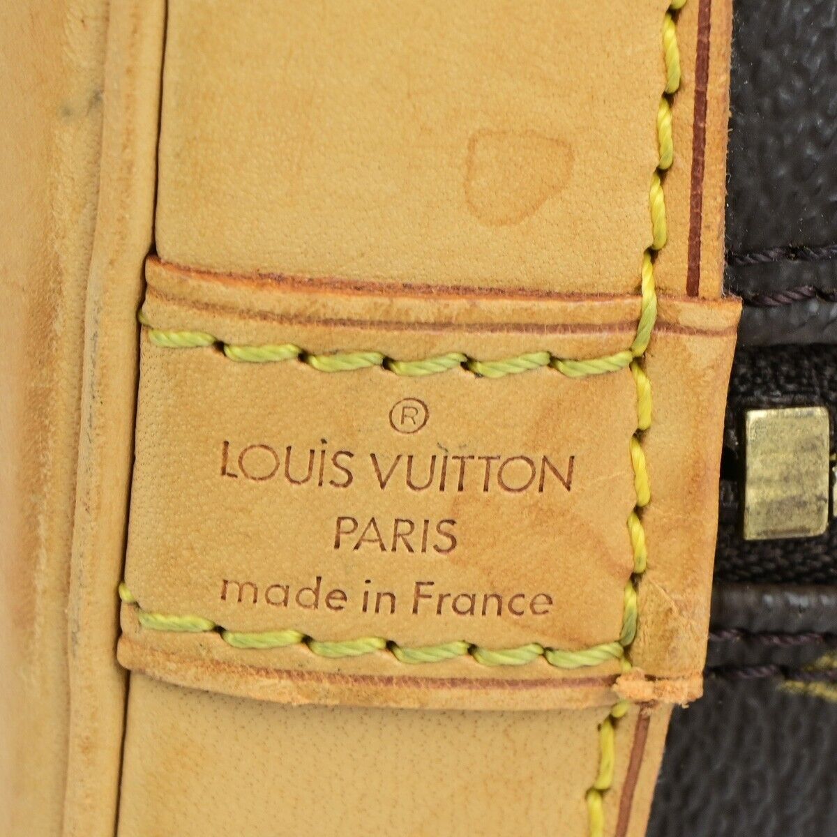 LOUIS VUITTON Alma Handbag