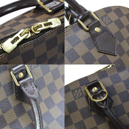 LOUIS VUITTON Alma Handbag