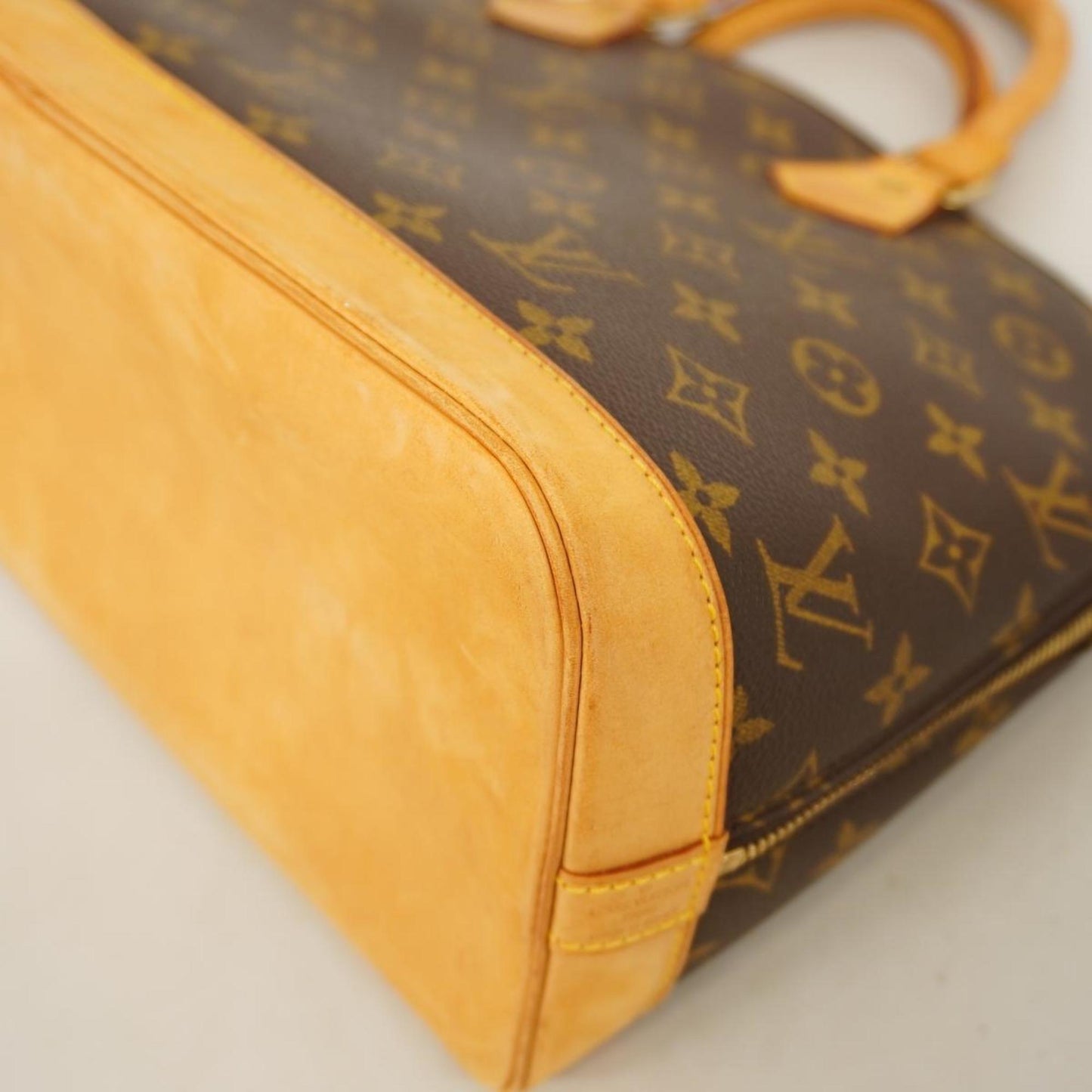 LOUIS VUITTON Alma Handbag