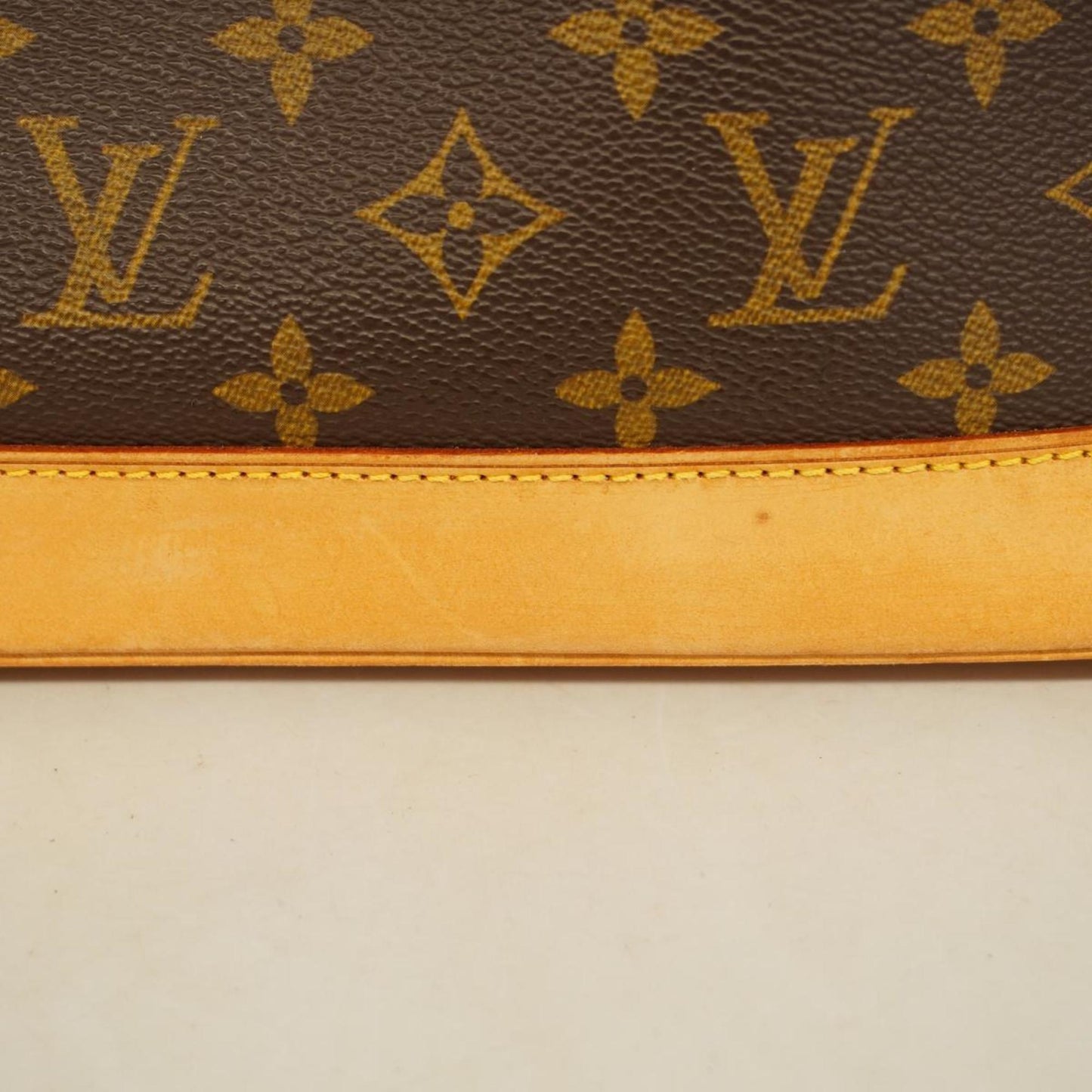 LOUIS VUITTON Alma Handbag