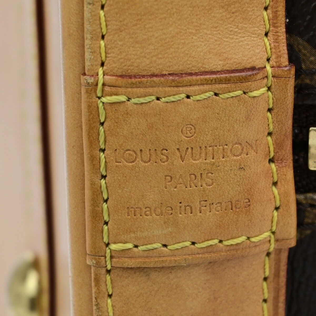 LOUIS VUITTON Alma Handbag