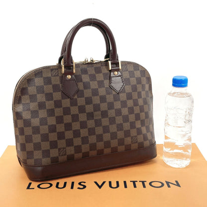 LOUIS VUITTON Alma Handbag