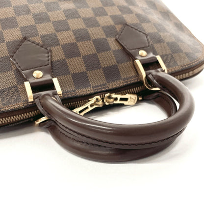 LOUIS VUITTON Alma Handbag