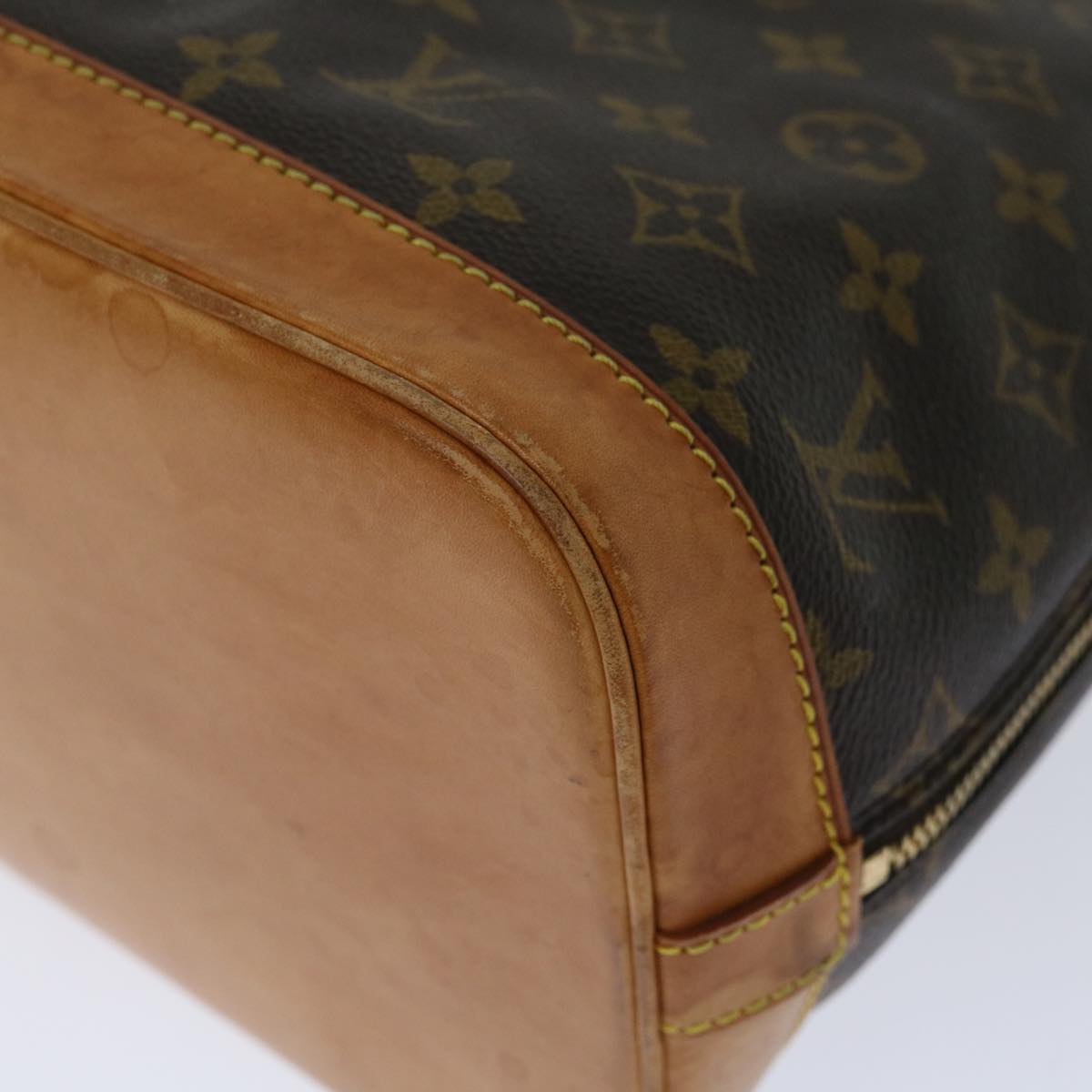 LOUIS VUITTON Alma Handbag