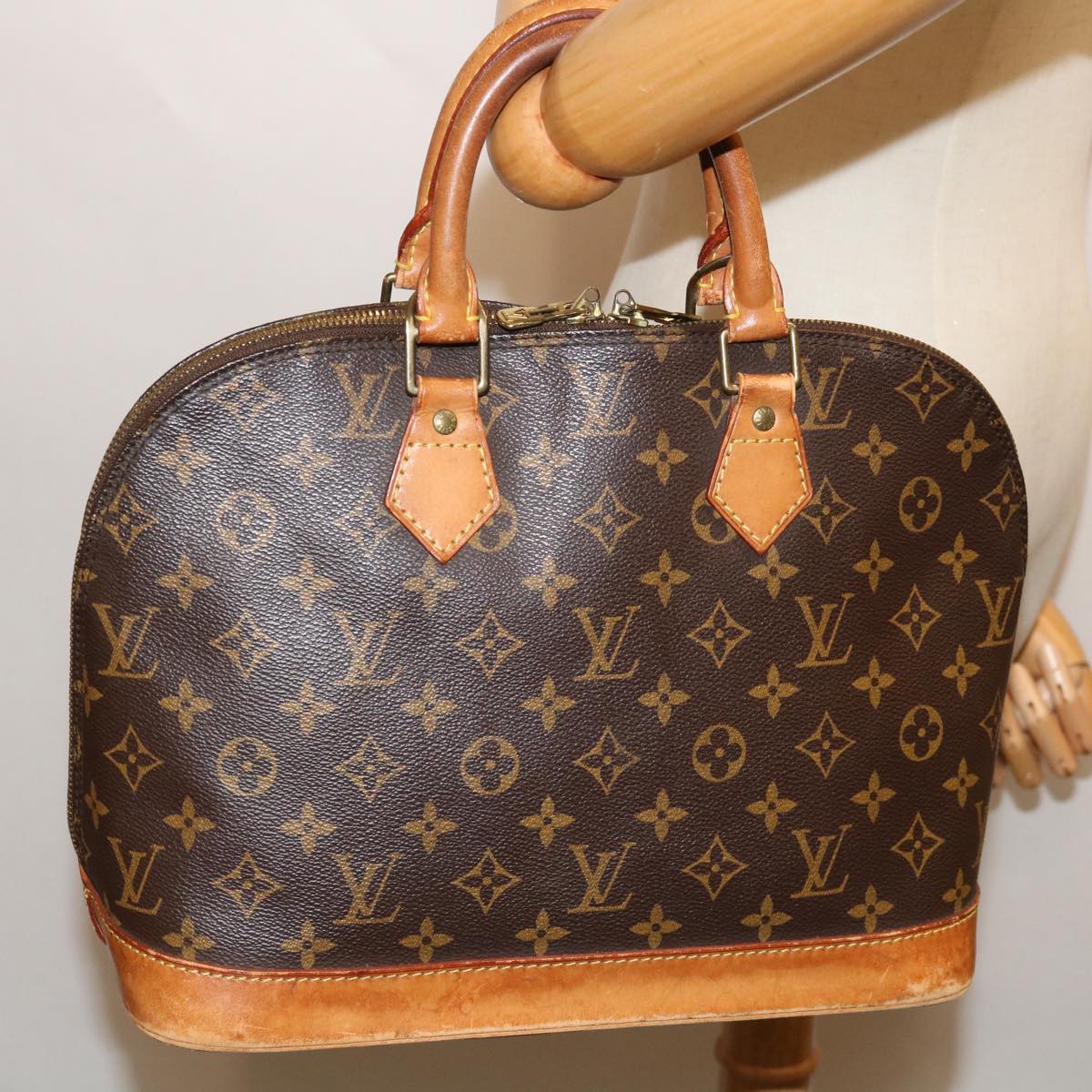 LOUIS VUITTON Alma Handbag