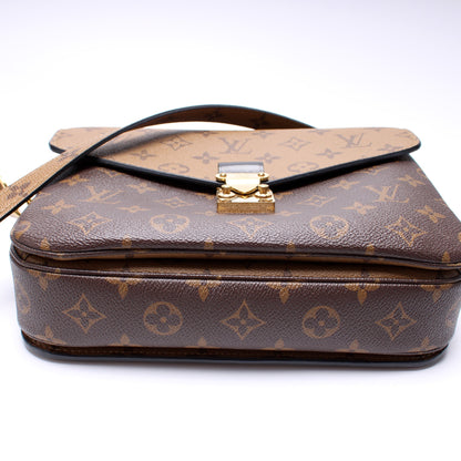 Pochette Metis Reverse Monogram