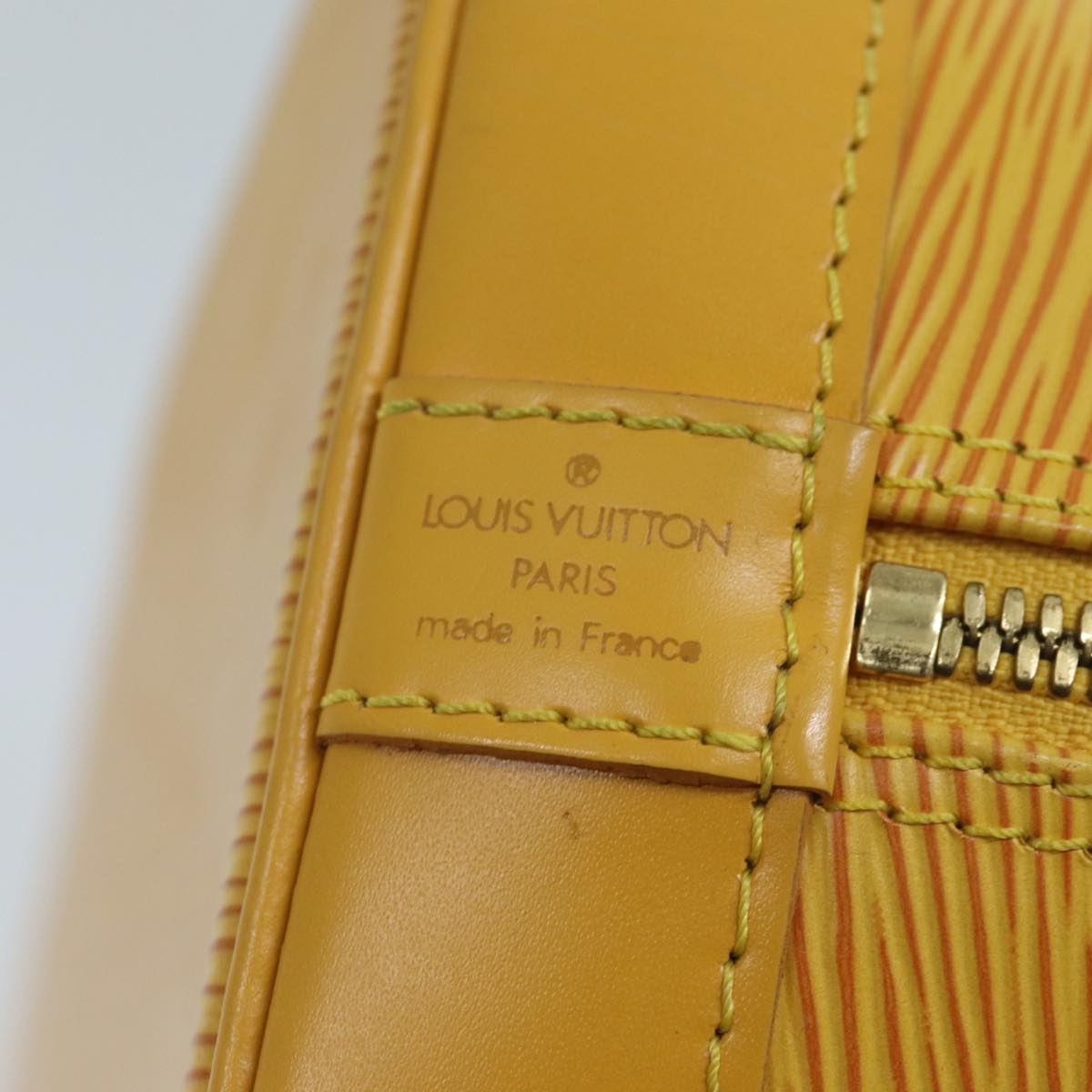 LOUIS VUITTON Alma Handbag