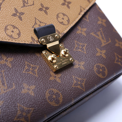 Pochette Metis Reverse Monogram