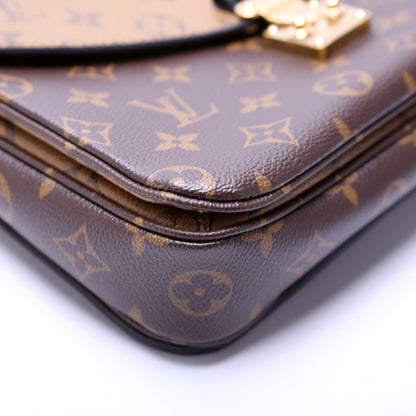 Pochette Metis Reverse Monogram