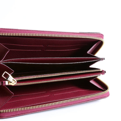 Zippy Wallet Retiro Monogram Plum