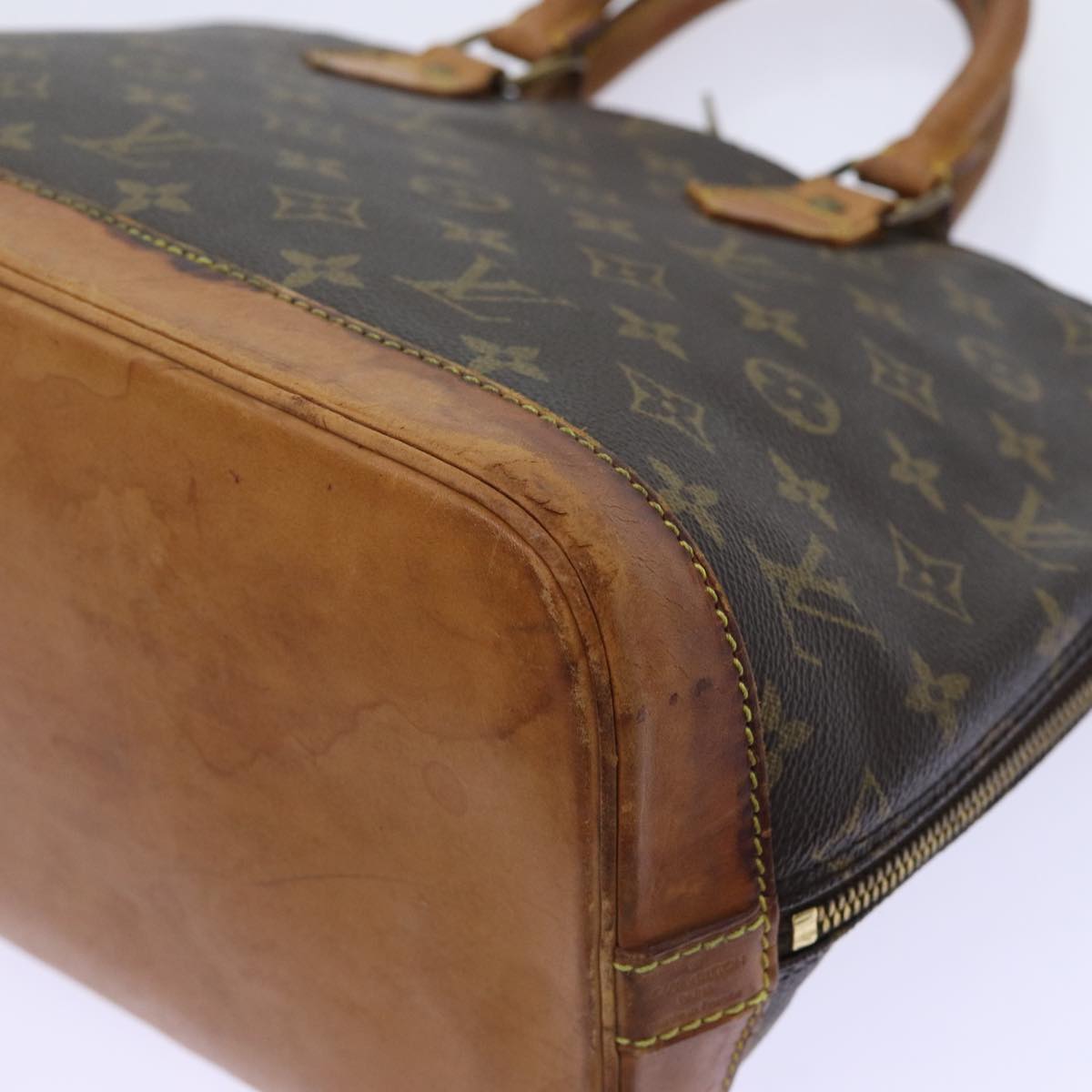 LOUIS VUITTON Alma Handbag