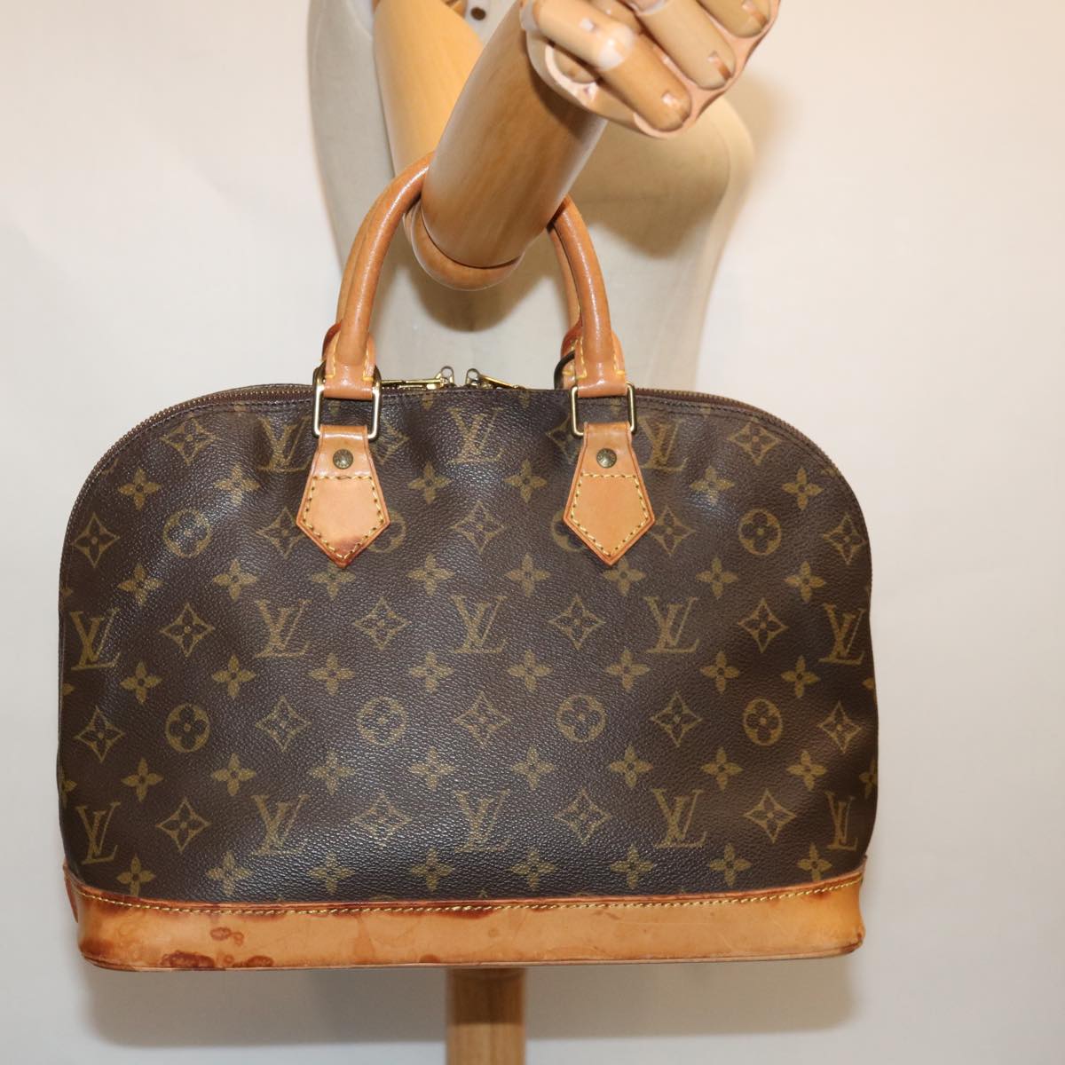 LOUIS VUITTON Alma Handbag