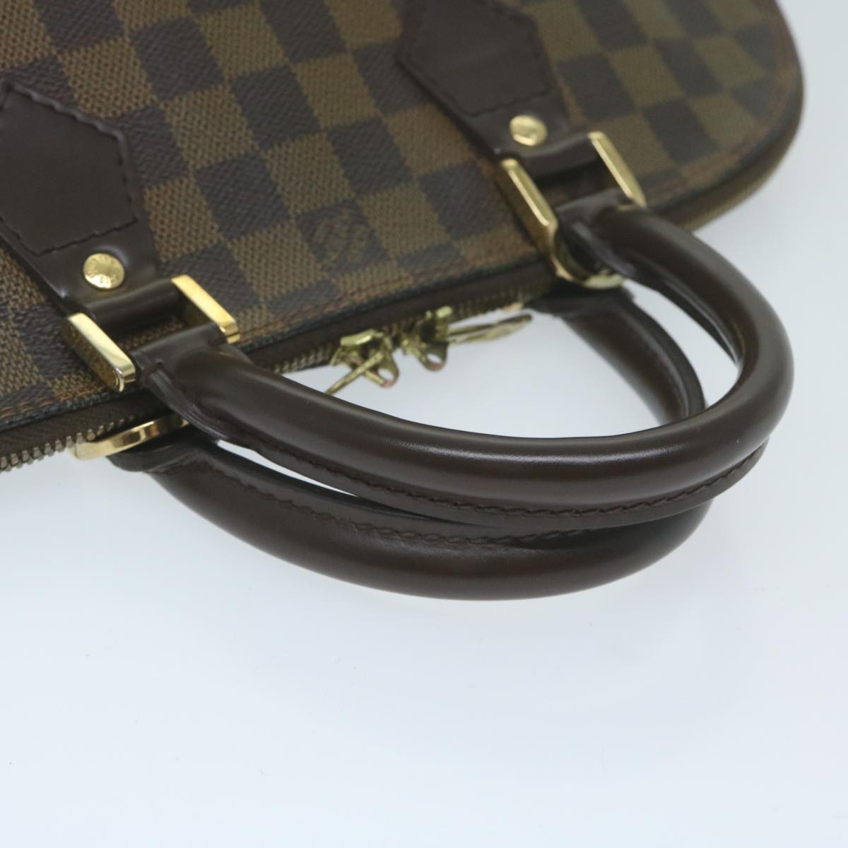 LOUIS VUITTON Alma Handbag