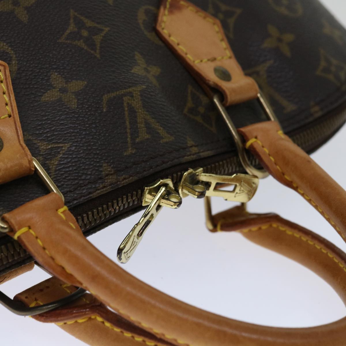 LOUIS VUITTON Alma Handbag