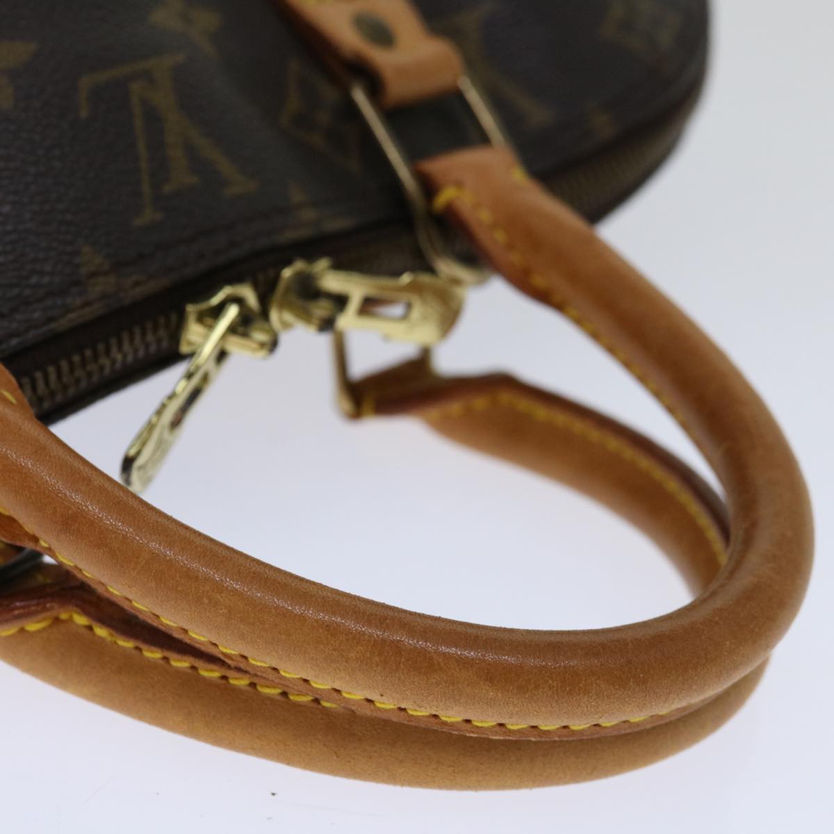 LOUIS VUITTON Alma Handbag