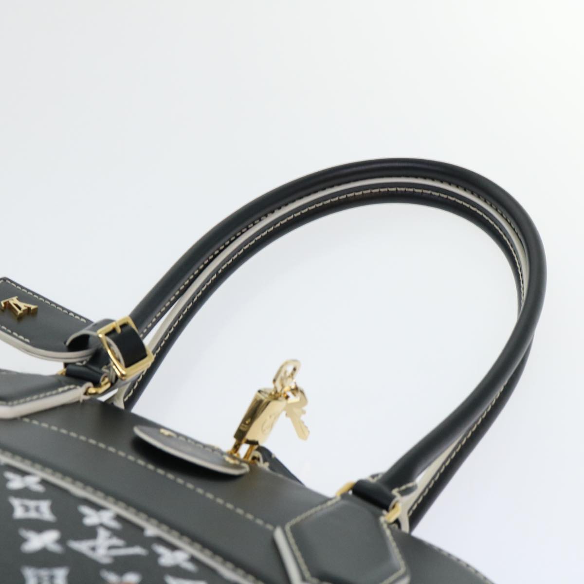 LOUIS VUITTON Alma Handbag