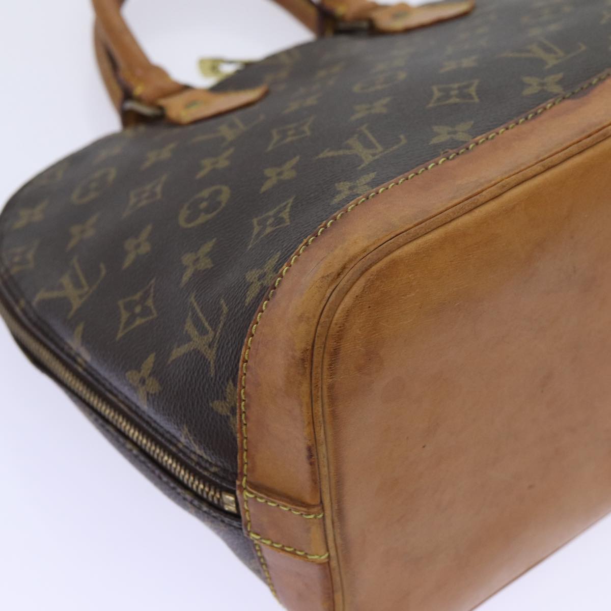 LOUIS VUITTON Alma Handbag