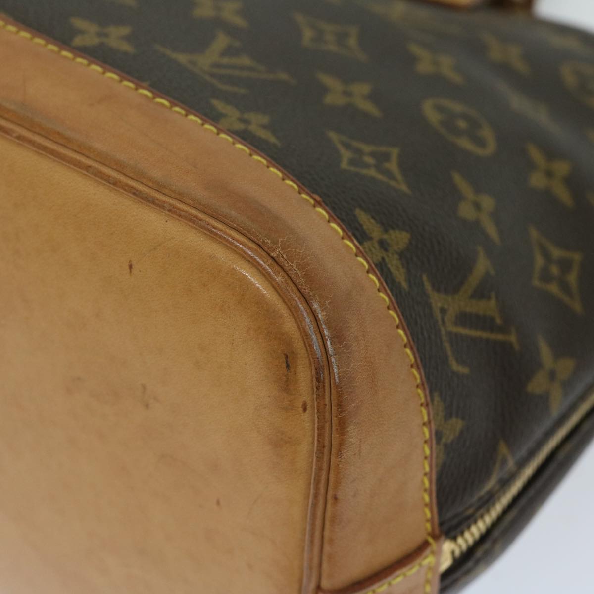 LOUIS VUITTON Alma Handbag