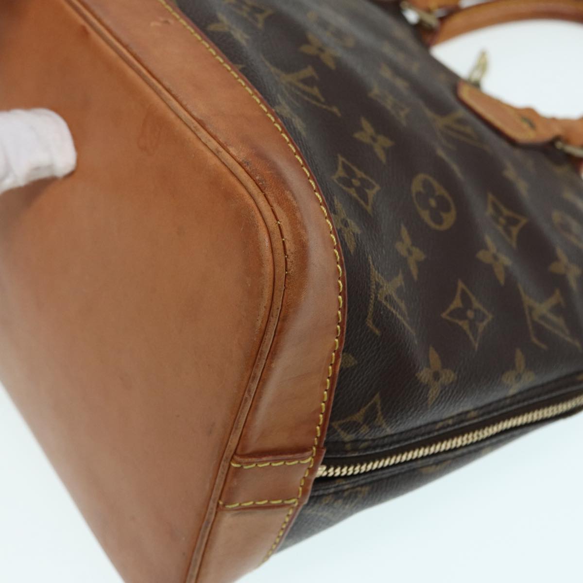 LOUIS VUITTON Alma Handbag