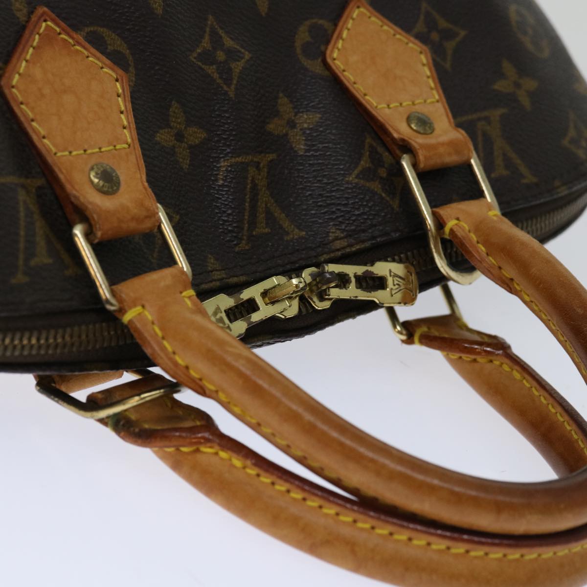 LOUIS VUITTON Alma Handbag