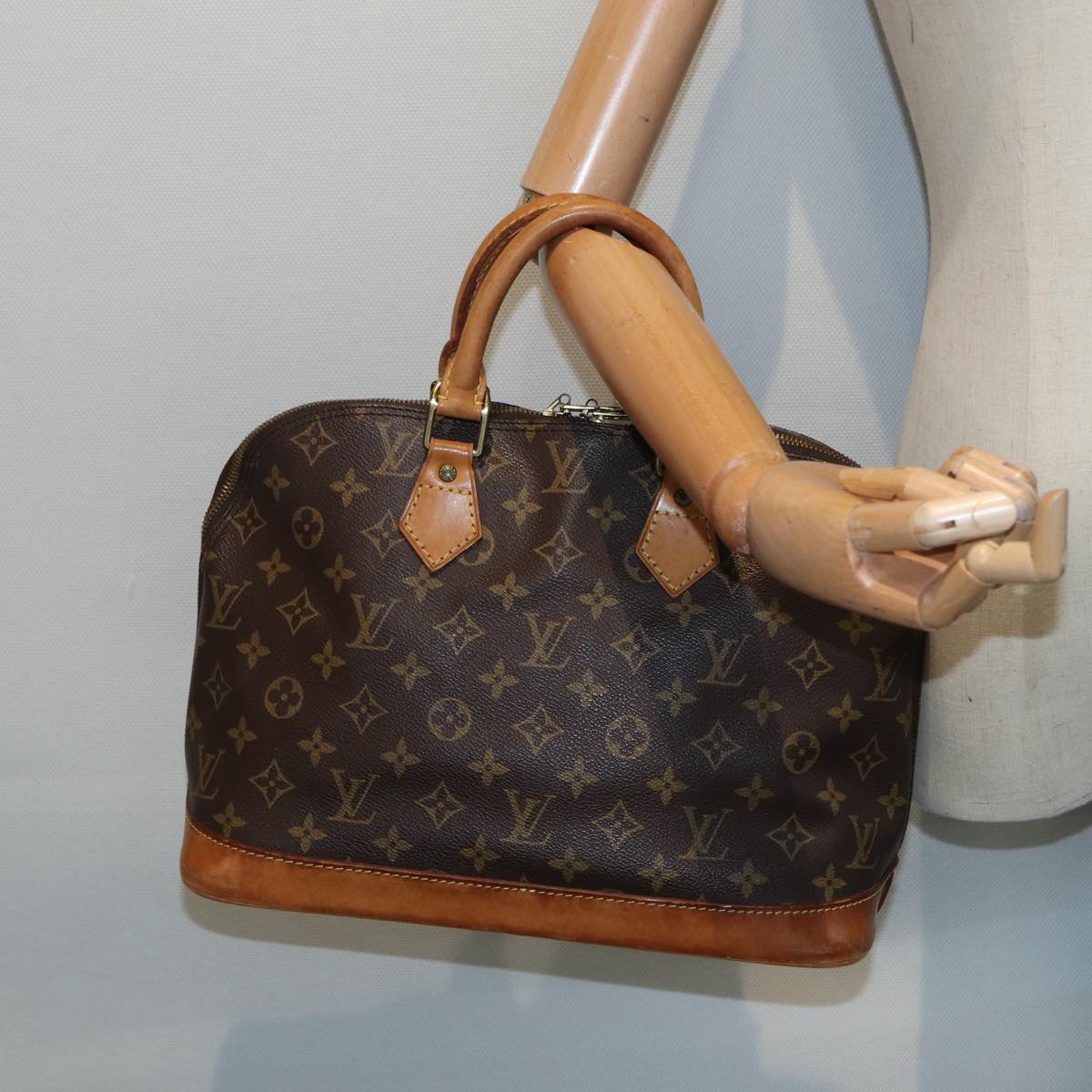 LOUIS VUITTON Alma Handbag