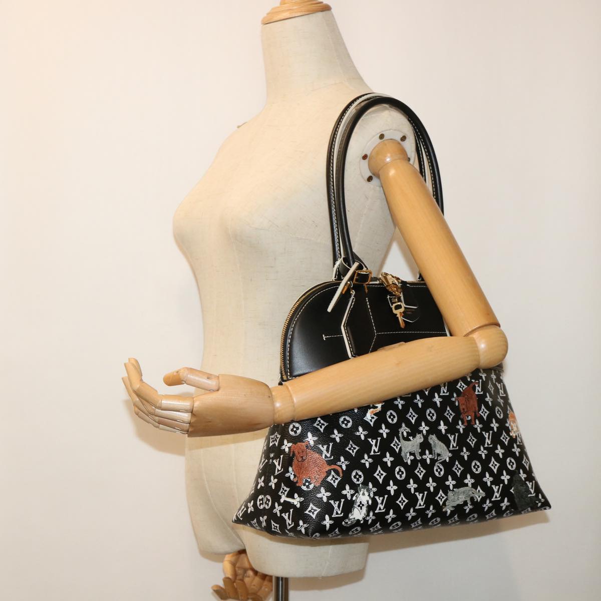 LOUIS VUITTON Alma Handbag