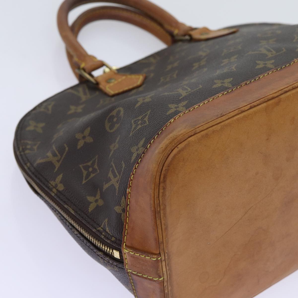 LOUIS VUITTON Alma Handbag