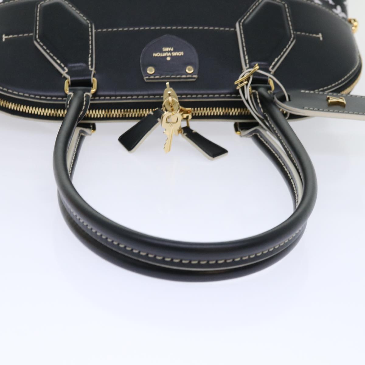 LOUIS VUITTON Alma Handbag