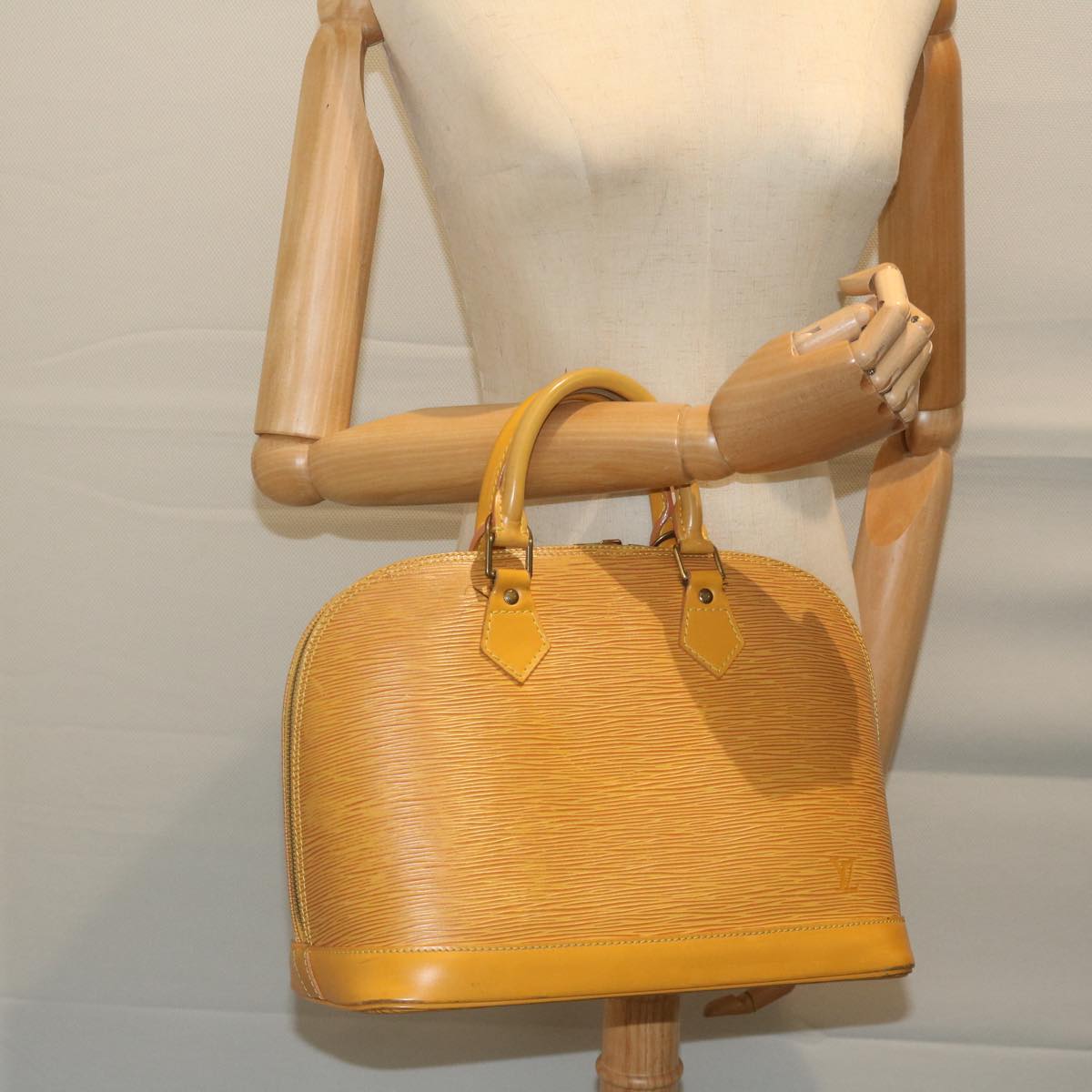 LOUIS VUITTON Alma Handbag