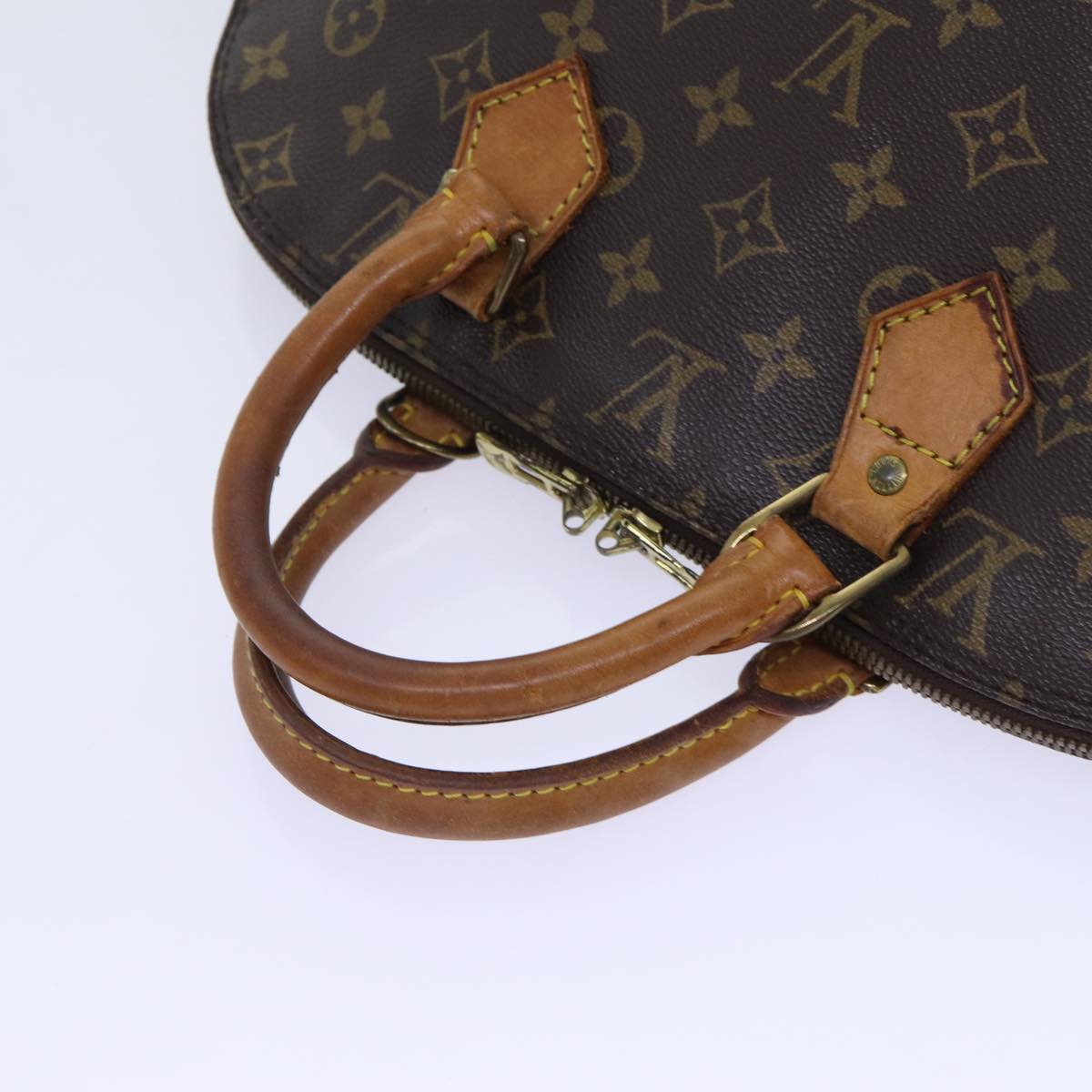 LOUIS VUITTON Alma Handbag