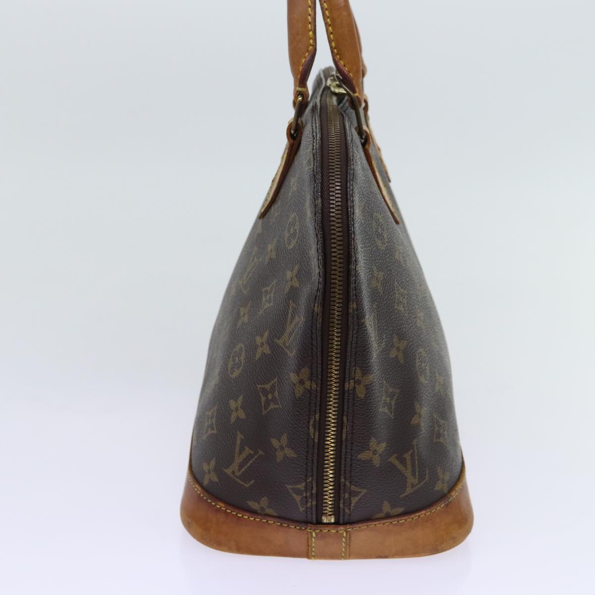 LOUIS VUITTON Alma Handbag