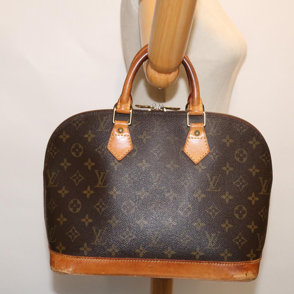 LOUIS VUITTON Alma Handbag