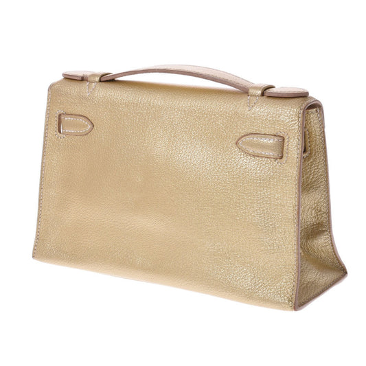 Hermes Pochette Kelly Metallic Gold  I Engraved (around 2005) Ladies Goat Chevre HandBag