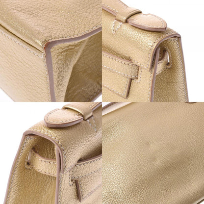 Hermes Pochette Kelly Metallic Gold  I Engraved (around 2005) Ladies Goat Chevre HandBag