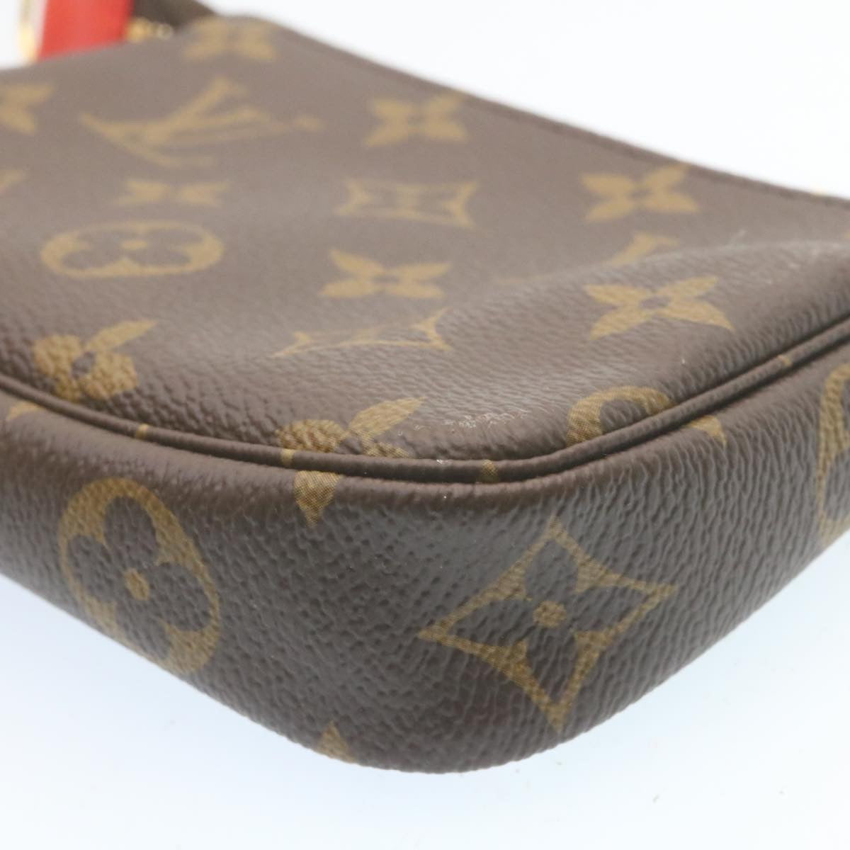 Louis Vuitton  Monogram Vivienne Mini Pochette Accessoires M69976 Auth 28293A