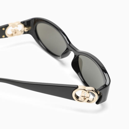 Gucci Black Oval Sunglasses Women