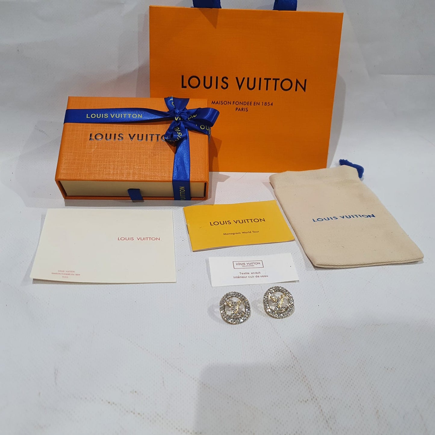 Louis Vuitton Earrings.