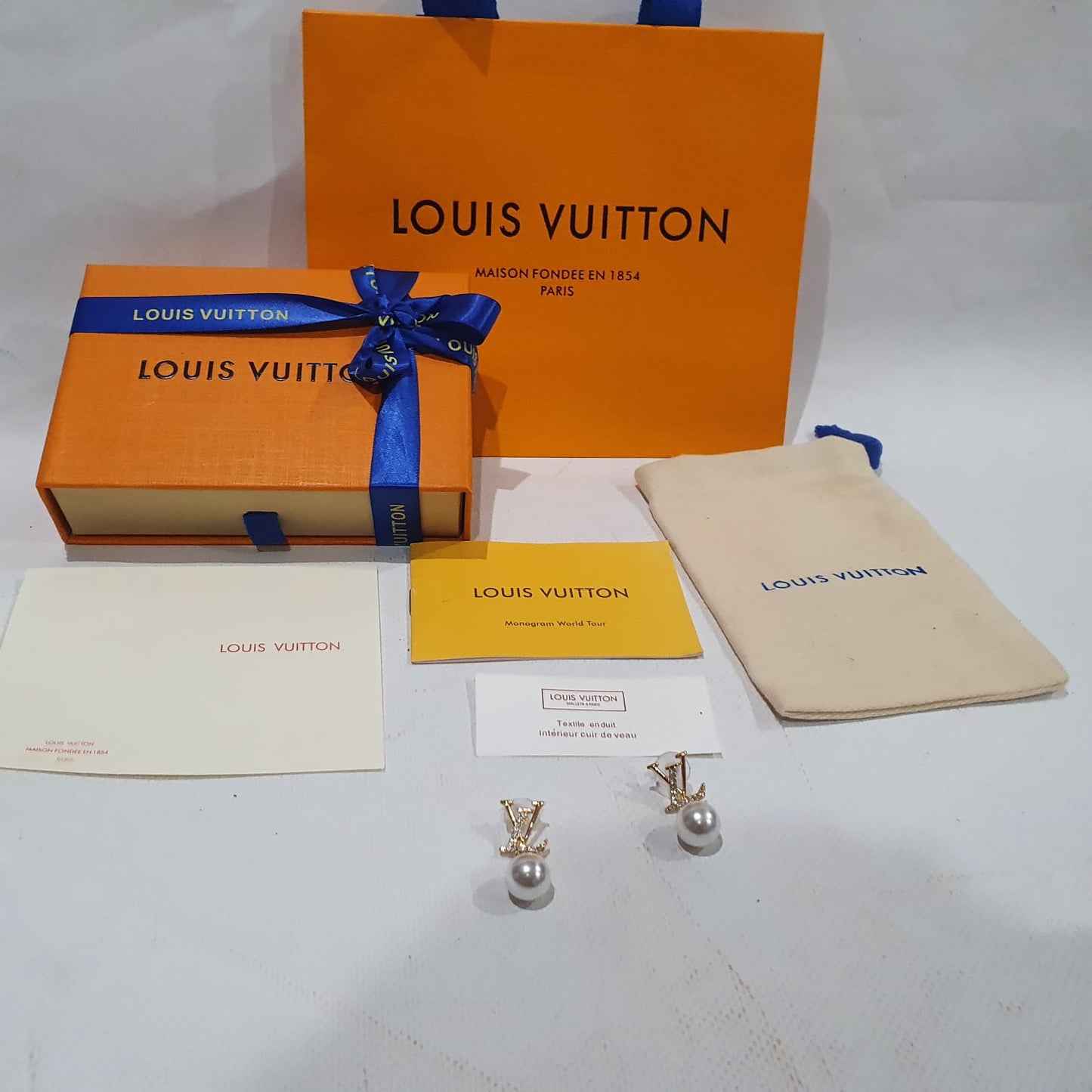 Louis Vuitton Earrings.