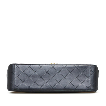 Chanel Maxi Classic Lambskin Double Flap (SHG-EmVxmM)