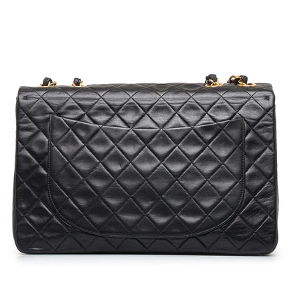 Chanel Maxi Classic Lambskin Double Flap (SHG-V4WtgE)