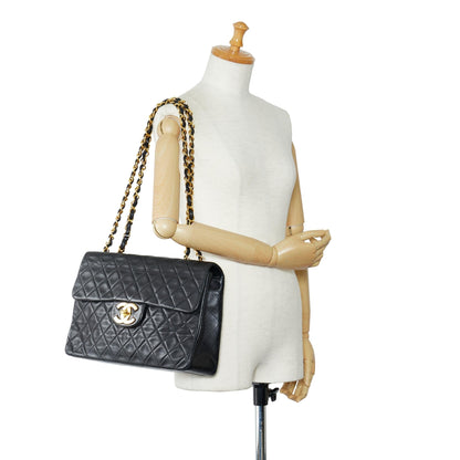 Chanel Maxi Classic Lambskin Double Flap (SHG-V4WtgE)