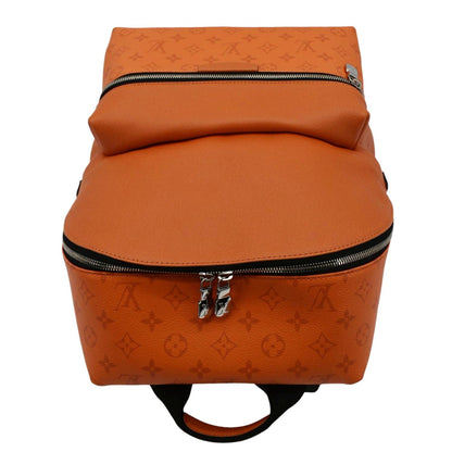 LOUIS VUITTON Discovery Taiga leather Backpack Orange