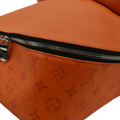 LOUIS VUITTON Discovery Taiga leather Backpack Orange