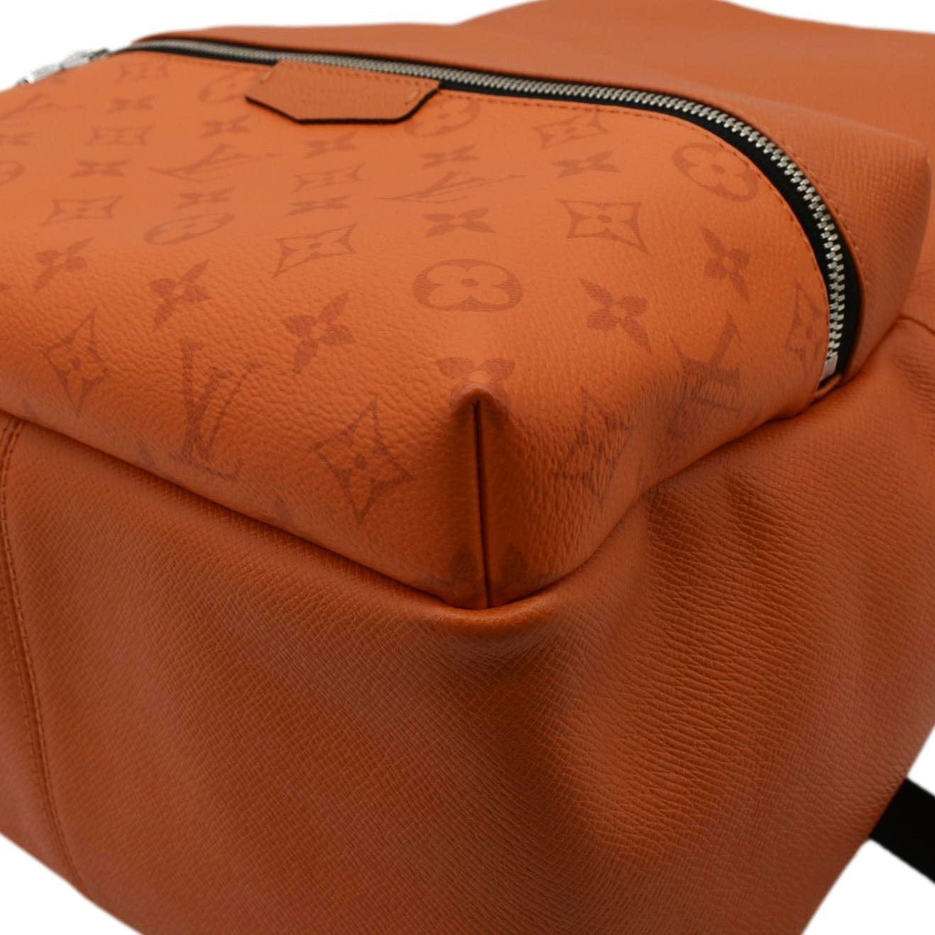 LOUIS VUITTON Discovery Taiga leather Backpack Orange