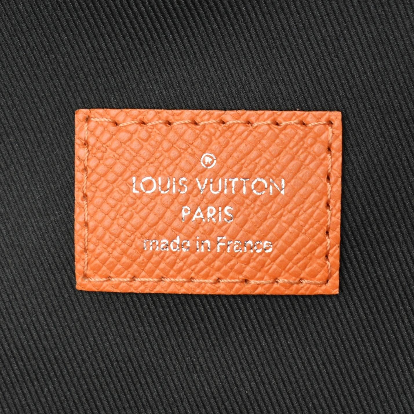 LOUIS VUITTON Discovery Taiga leather Backpack Orange